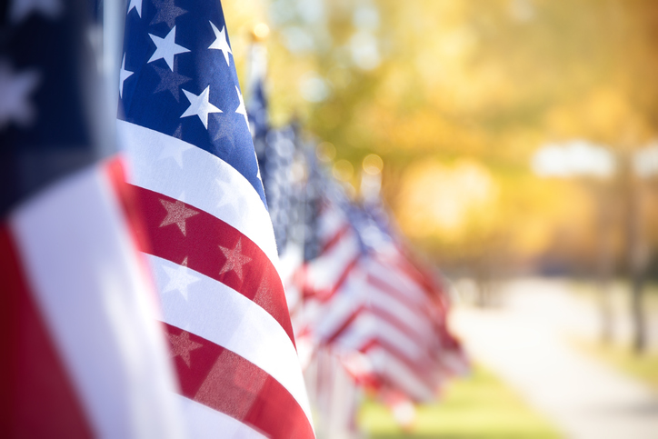 Closeup of an American flag in a row